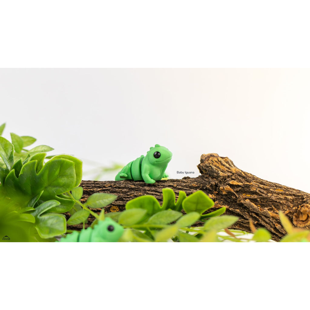 Baby Iguana (ZOU3D) — single figure perched on log, official lifestyle render