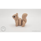 Baby Squirrel Zou3D 3D printed articulated fidget toy — 3/4 left side view showing articulation joints across body and arching tail segments — Sensory Sidequest Australia