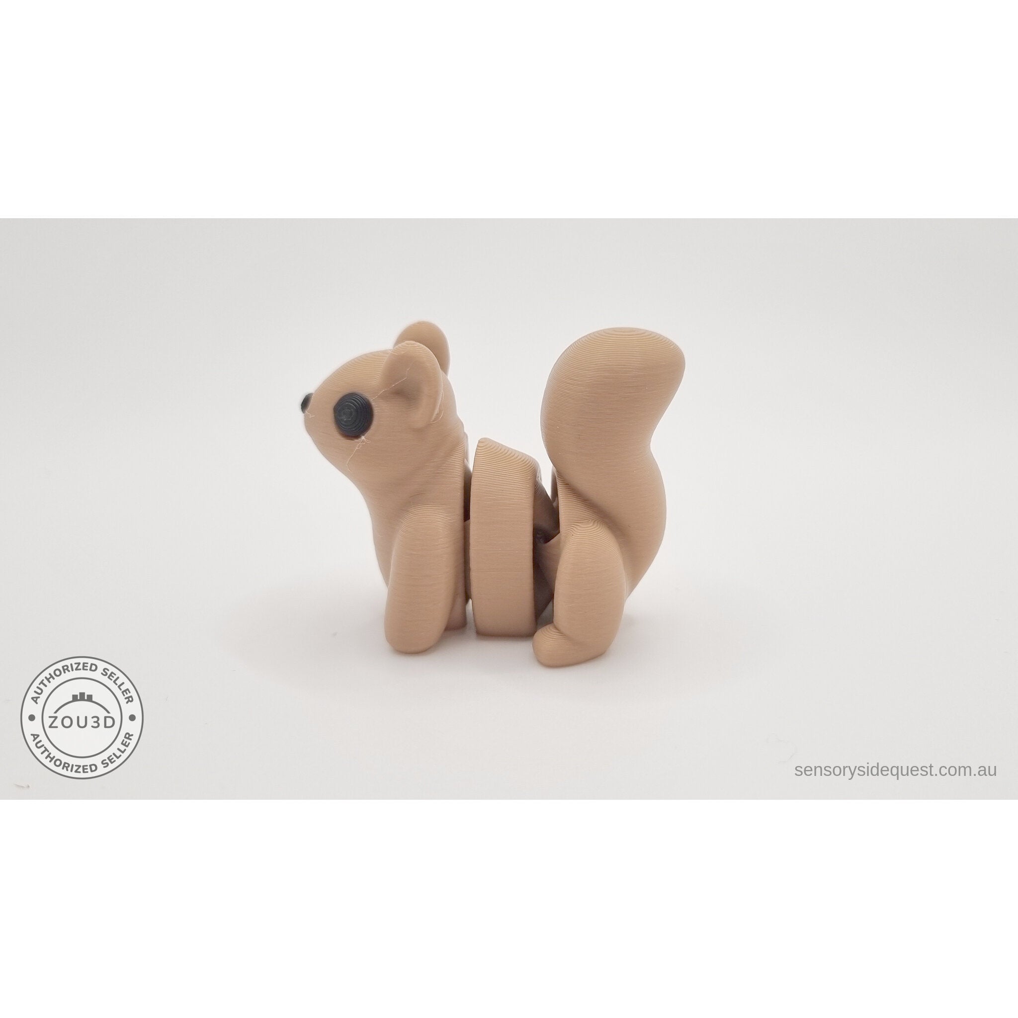 Baby Squirrel Zou3D 3D printed articulated fidget toy — 3/4 left side view showing articulation joints across body and arching tail segments — Sensory Sidequest Australia