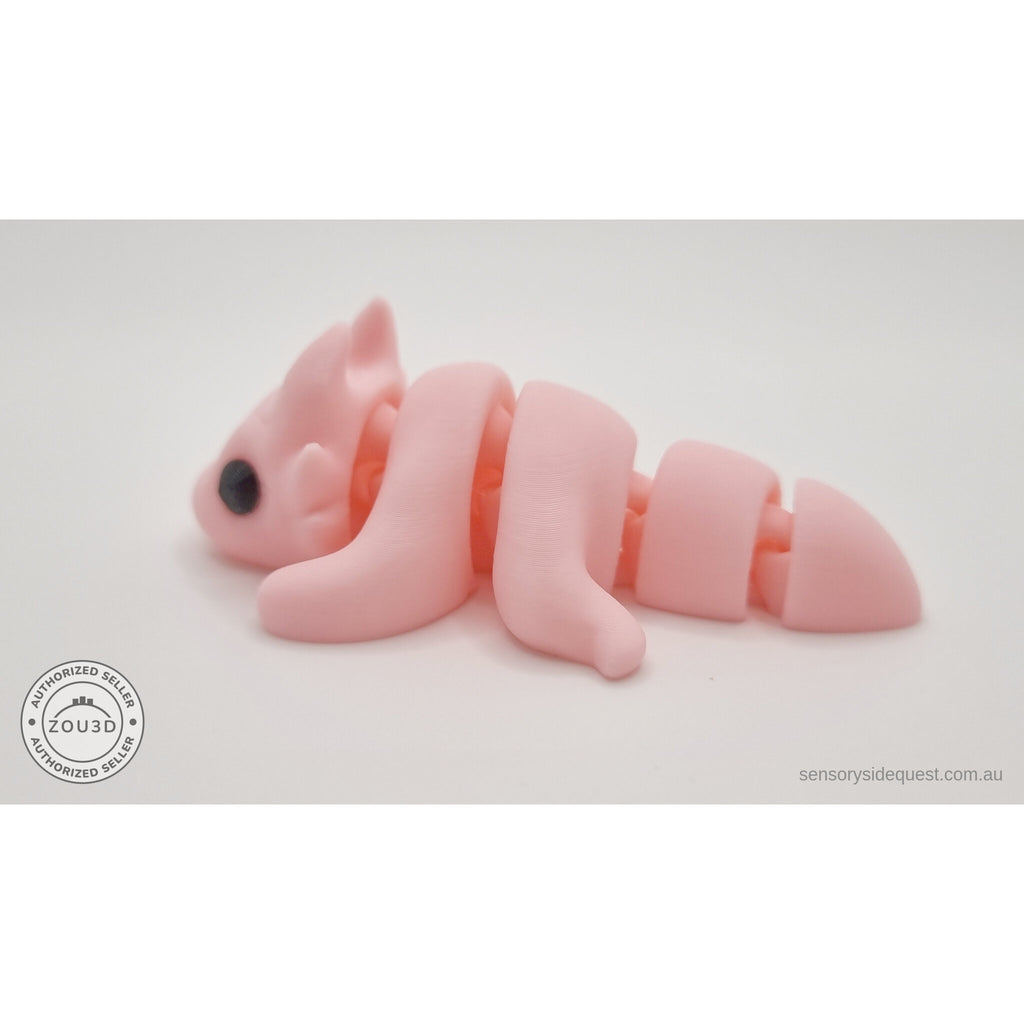 Pink Tiny Dragon 3D printed toy — right-facing side view showing articulation segments and tail — Sensory Sidequest Australia