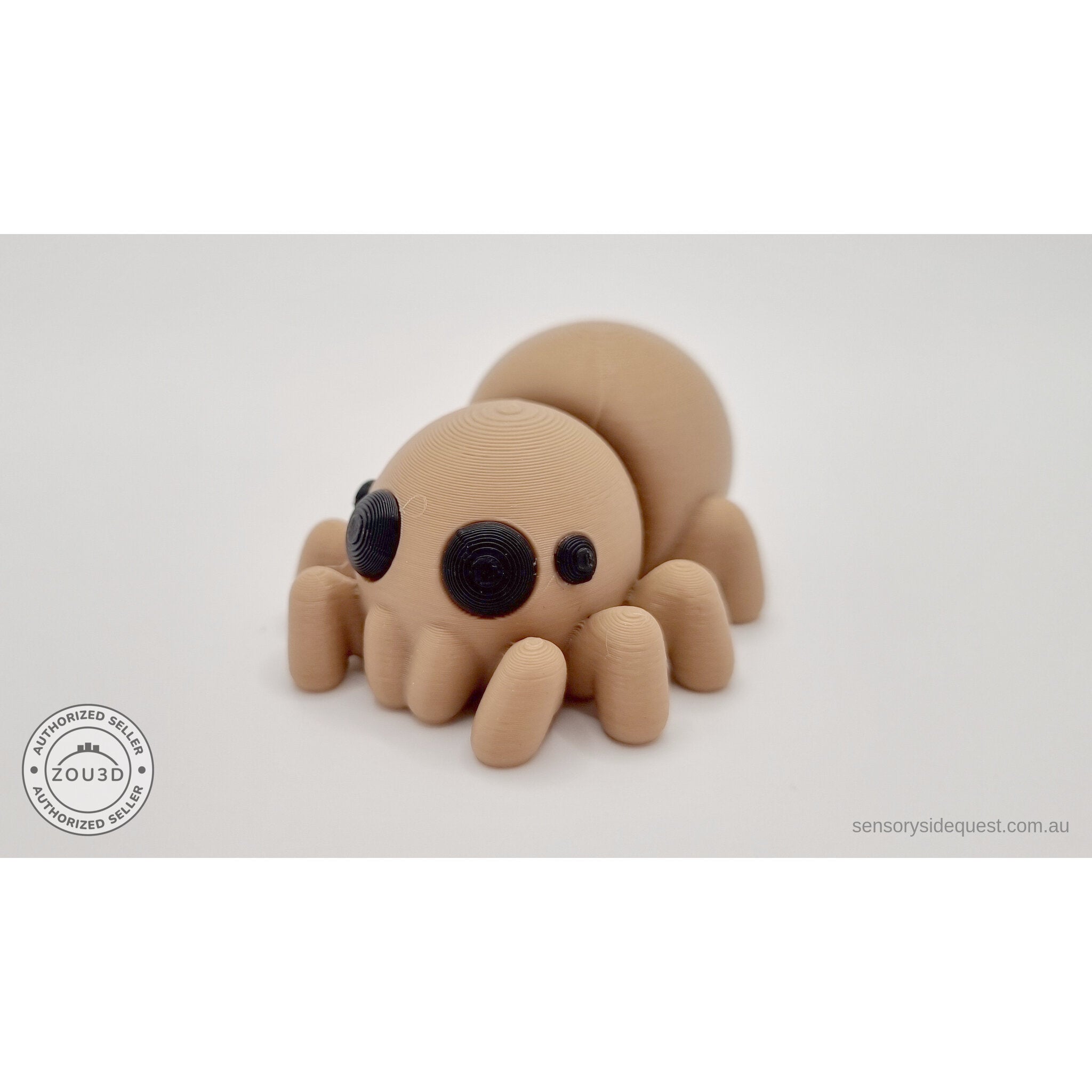 Baby Spider articulated fidget toy — front three-quarter view showing all eight legs and expressive chibi eyes