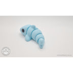 024-SHK Baby Shark in ice blue matte, twisted/flexed pose showing segment articulation — 3D printed fidget toy by Sensory Sidequest