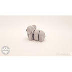 Grey Baby Elephant 3D printed articulated toy — rear view showing flexible body joints