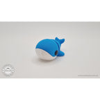 Baby Blue Whale 3D printed articulated fidget toy — 3/4 left side view showing full body with white belly and articulation joints, own photo by Sensory Sidequest