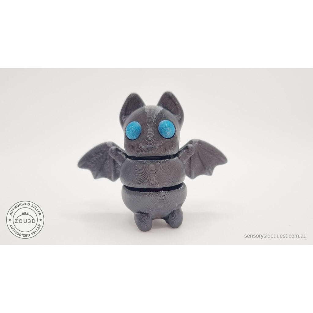 Tiny Bat rear three-quarter view showing wing detail and body segmentation — blue eye variant