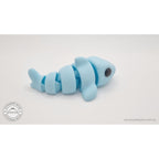 024-SHK Baby Shark in ice blue matte, head-on close-up showing chibi face and eye detail — 3D printed fidget toy by Sensory Sidequest