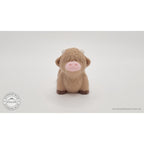 Baby Highland Cow 3D printed articulated fidget toy — three-quarter side view showing body segments stretched in articulated pose — Sensory Sidequest