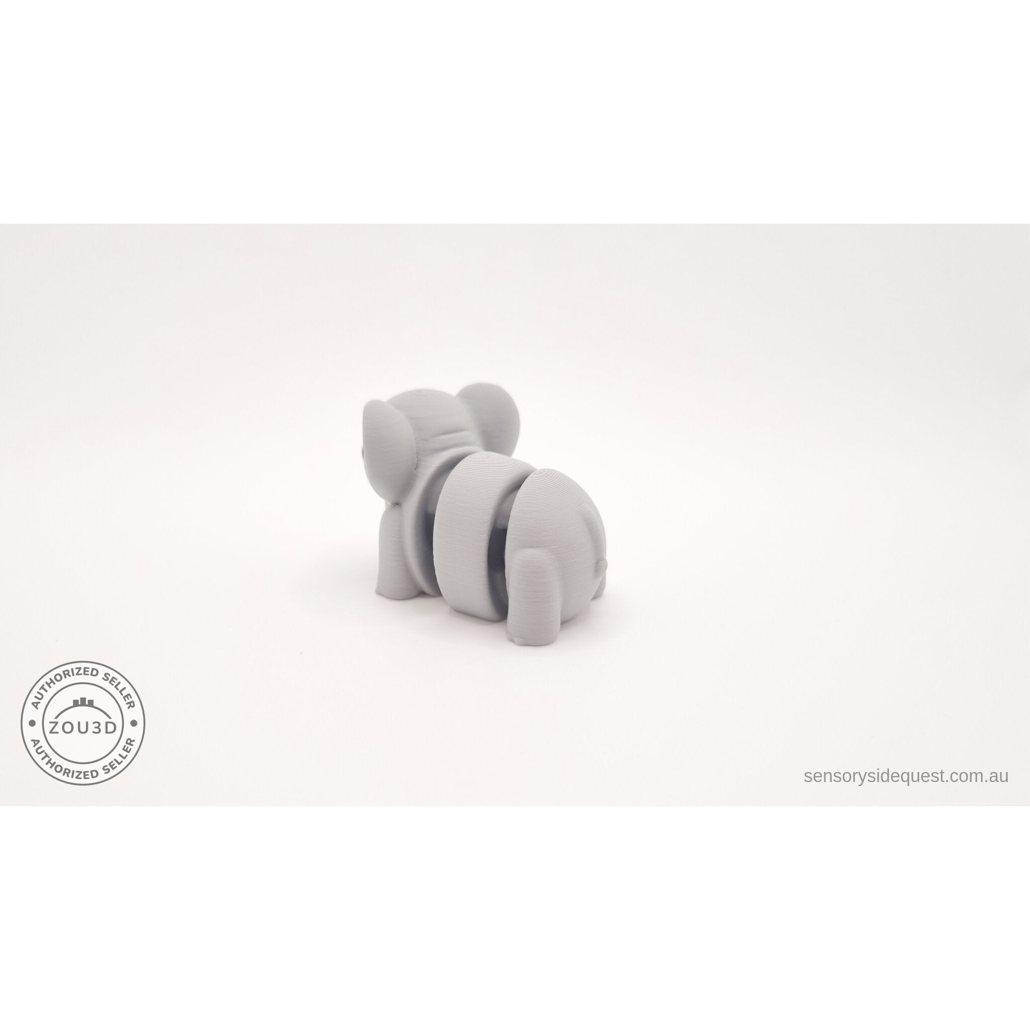 Grey Baby Elephant 3D printed toy — rear right view showing articulation detail