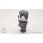Tiny Dracula 3D printed fidget toy — left side profile view showing figure silhouette and cape, own photo by Sensory Sidequest