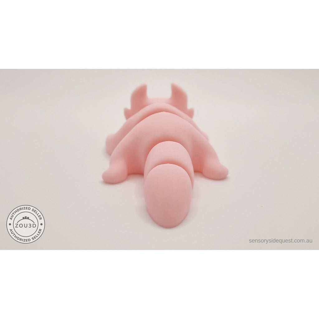 Pink Tiny Dragon fidget toy — straight front face view showing both expressive eyes and horns — Sensory Sidequest Australia