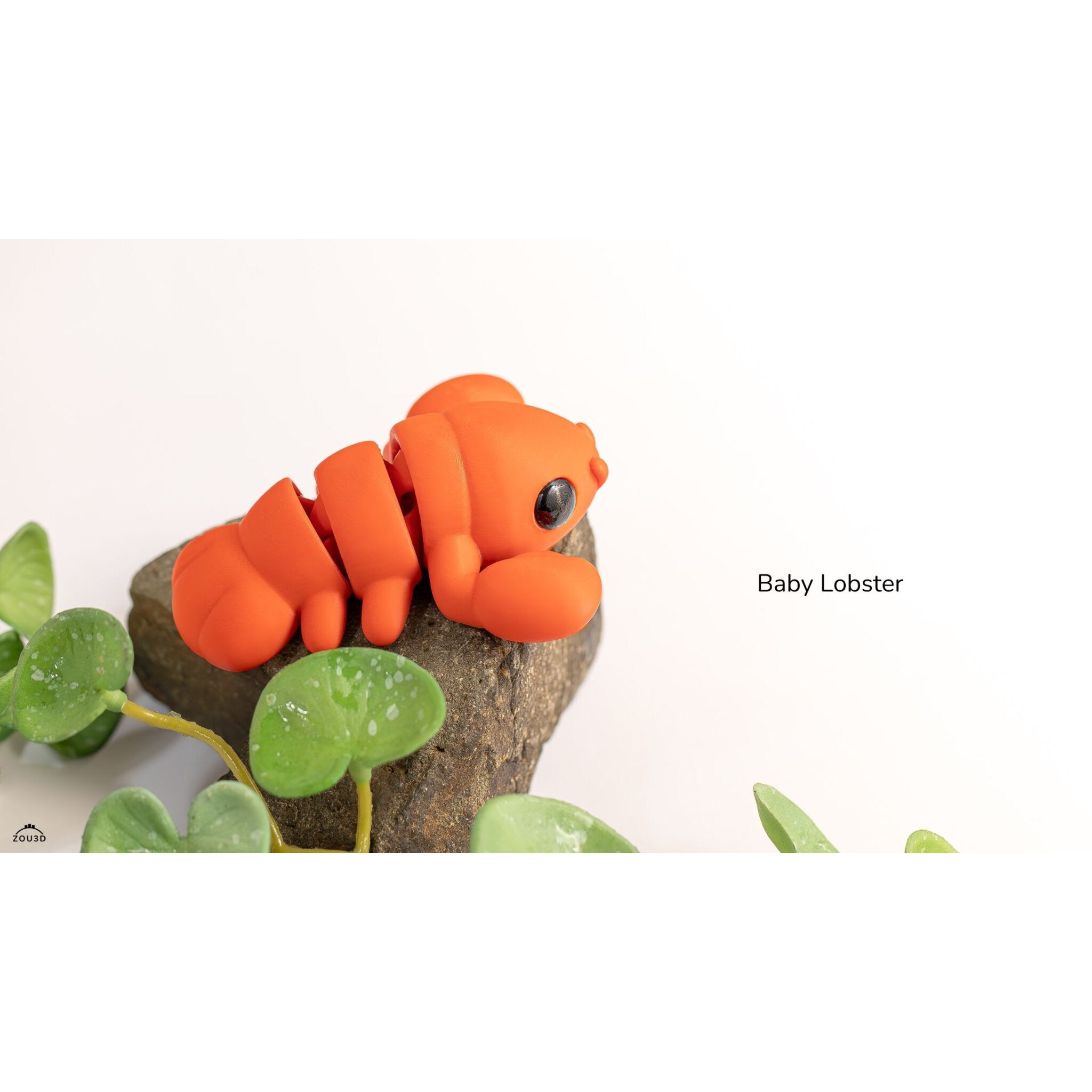 Baby Lobster articulated fidget toy — official Zou3D render, close-up rear angle on rock prop showing tail segmentation, orange colourway