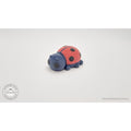 Red and navy Baby Ladybug 3D printed articulated fidget toy by Sensory Sidequest