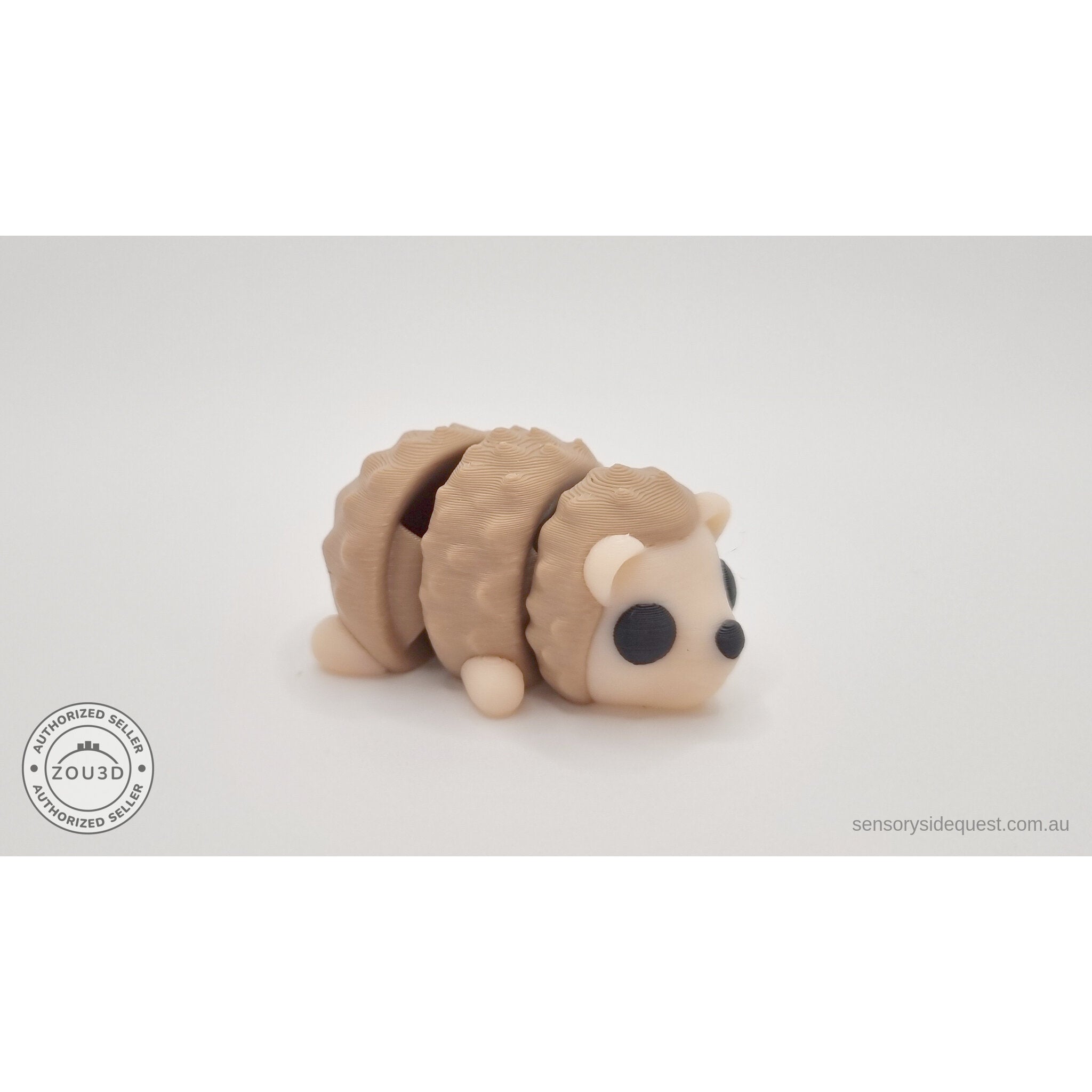 Baby Hedgehog articulated fidget toy — front-facing view showing expressive eyes and nose, own photo by Sensory Sidequest