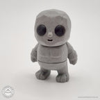 Grey Tiny Rock Golem 3D printed articulated fidget toy — front view by Sensory Sidequest