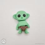 Green Tiny Goblin 3D printed articulated toy — front-facing overhead own photo