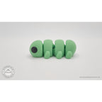 Green Baby Caterpillar 3D printed articulated fidget toy — rear 3/4 angle showing body length — Sensory Sidequest Australia