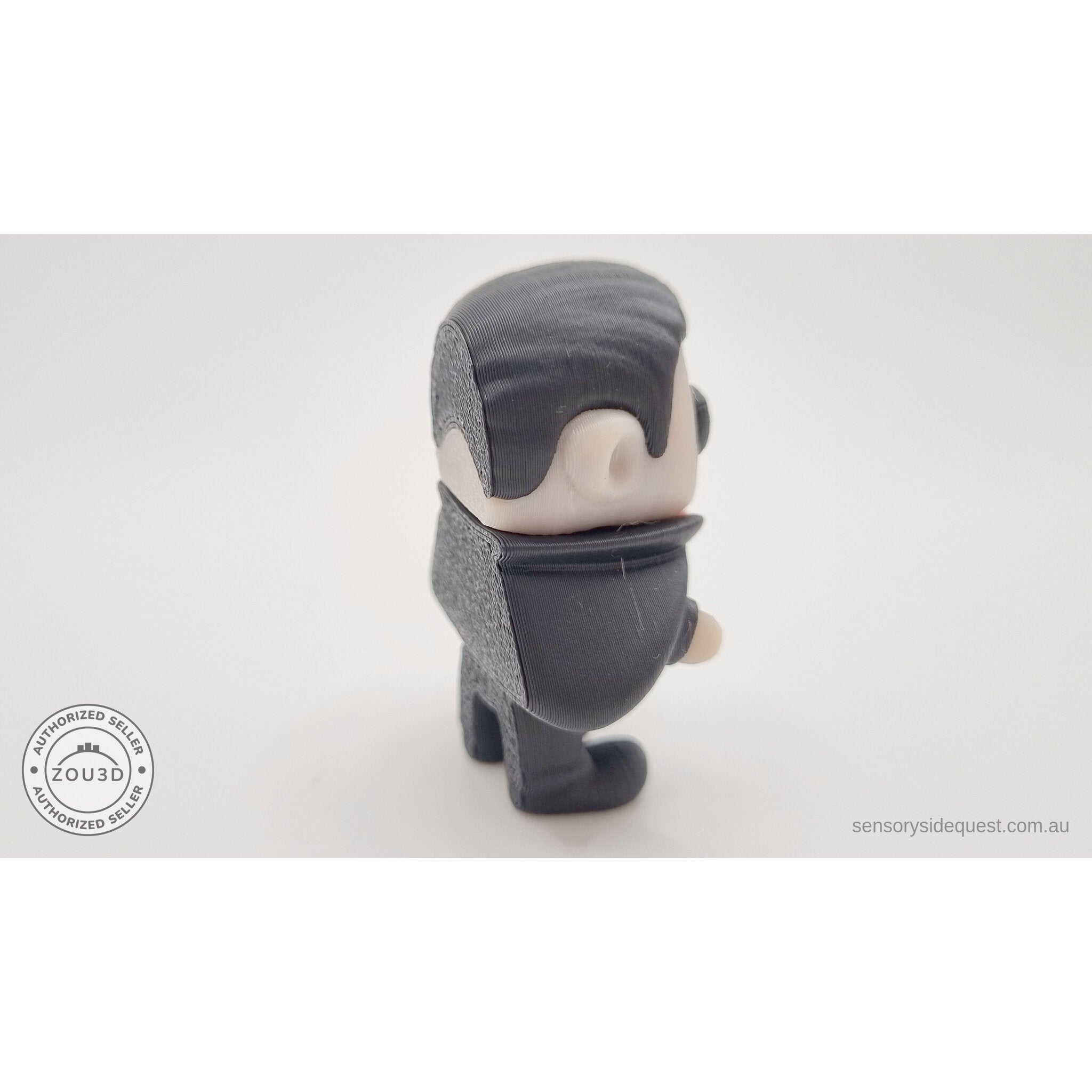 Tiny Dracula articulated toy — rear view showing cape back and figure from behind, own photo by Sensory Sidequest