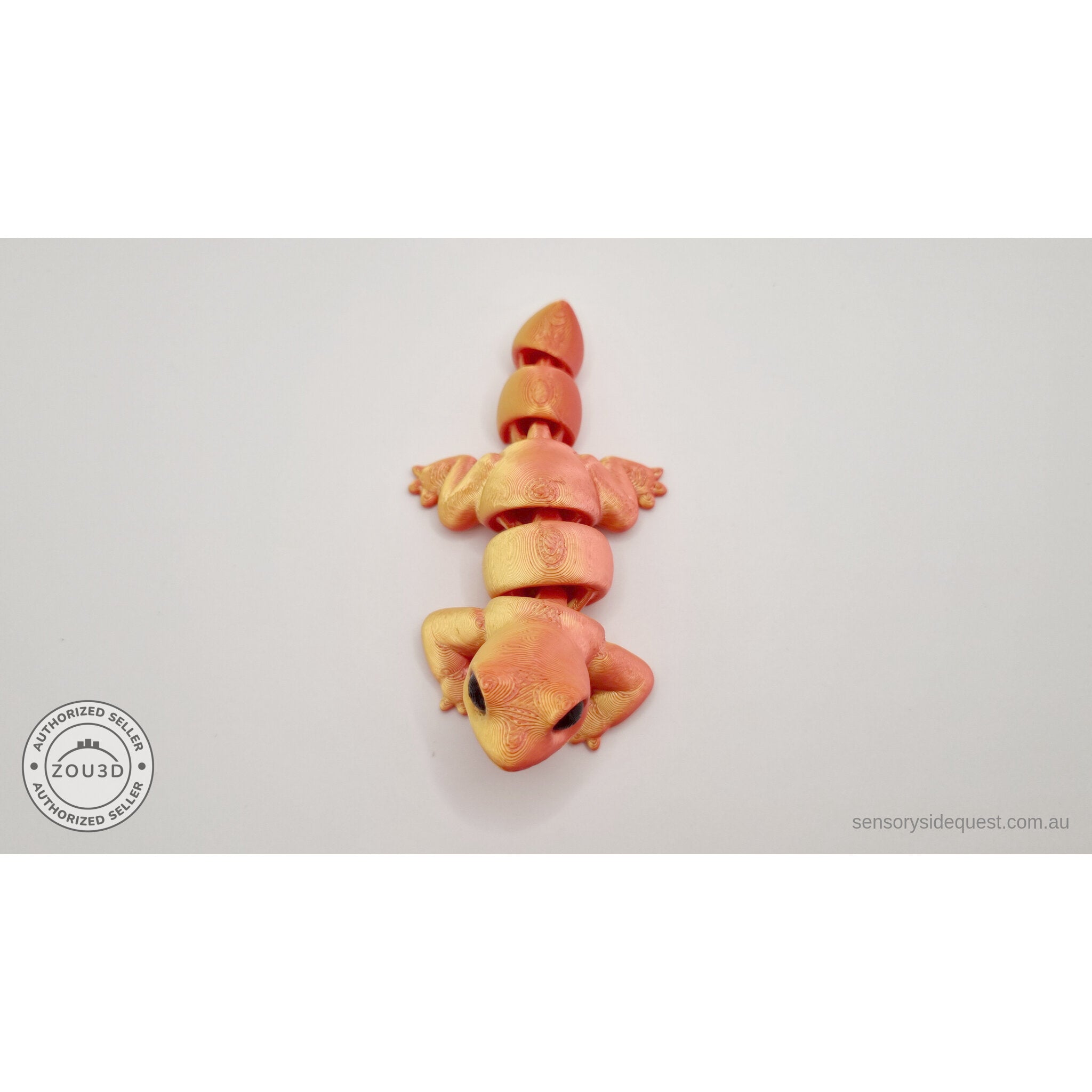 Red-gold Baby Lizard 3D printed articulated fidget toy — top-down view showing body segments and four legs — Sensory Sidequest