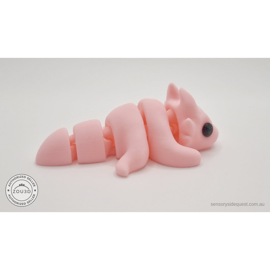 Pink Tiny Dragon articulated toy — 3/4 view from tail end showing segmented body detail — Sensory Sidequest Australia