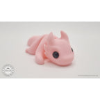 Pink Tiny Dragon 3D printed fidget toy — rear view showing tail and back of horns — Sensory Sidequest Australia