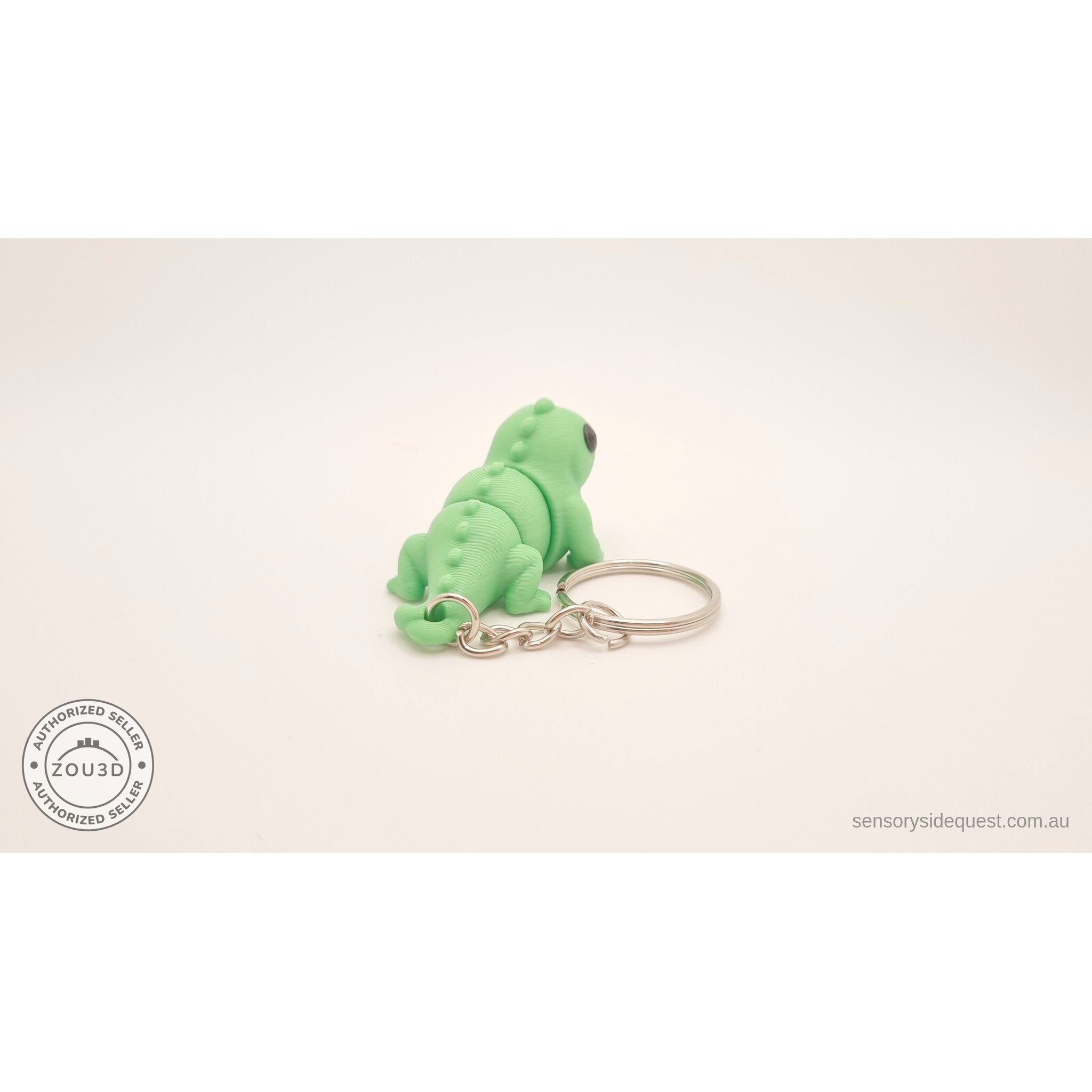 Green Baby Iguana keychain — rear angle showing dorsal ridge detail by Sensory Sidequest