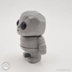 Grey Tiny Rock Golem 3D printed articulated fidget toy — side view by Sensory Sidequest