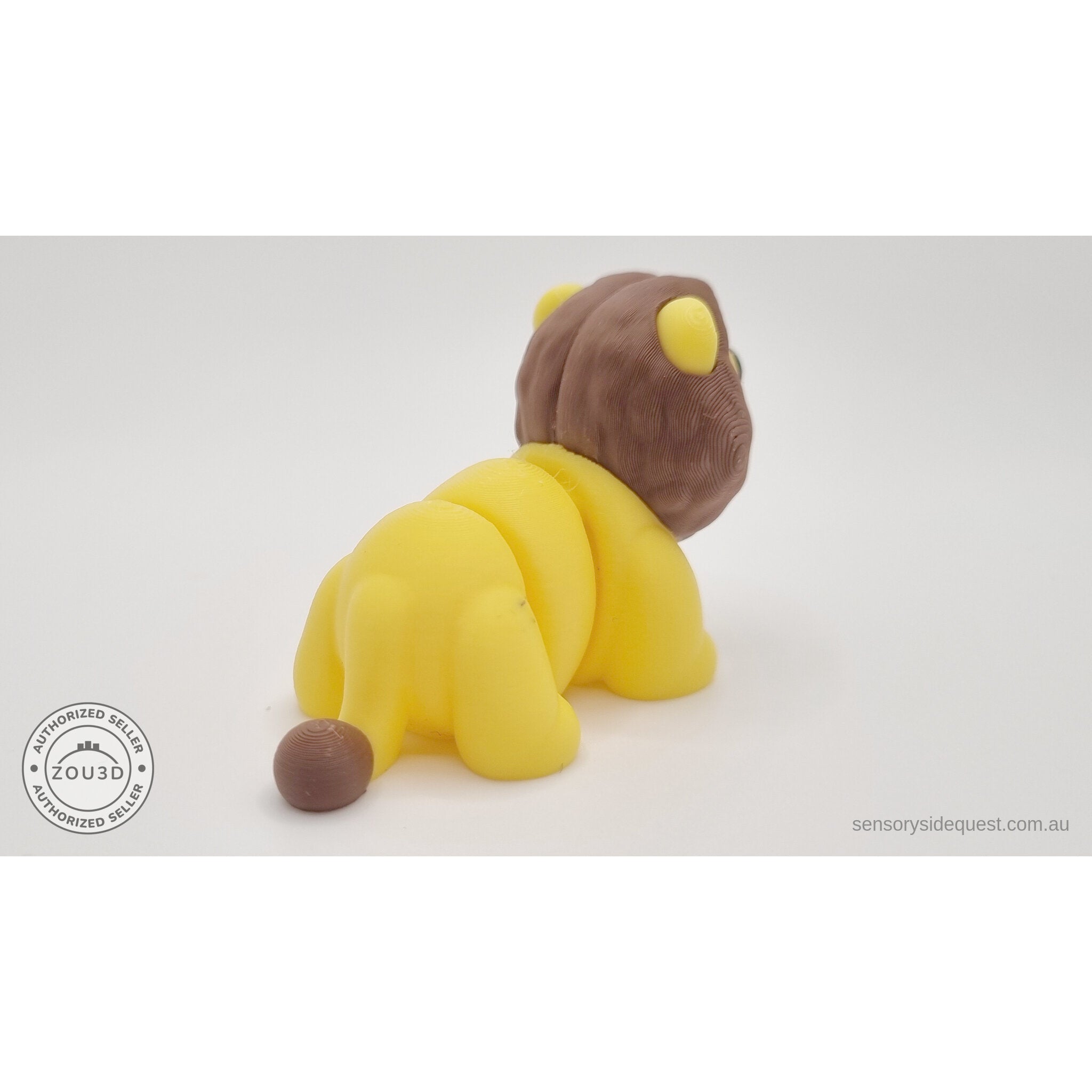 Yellow and brown Baby Lion 3D printed articulated fidget toy — rear 3/4 view showing tail and back profile — Sensory Sidequest Australia