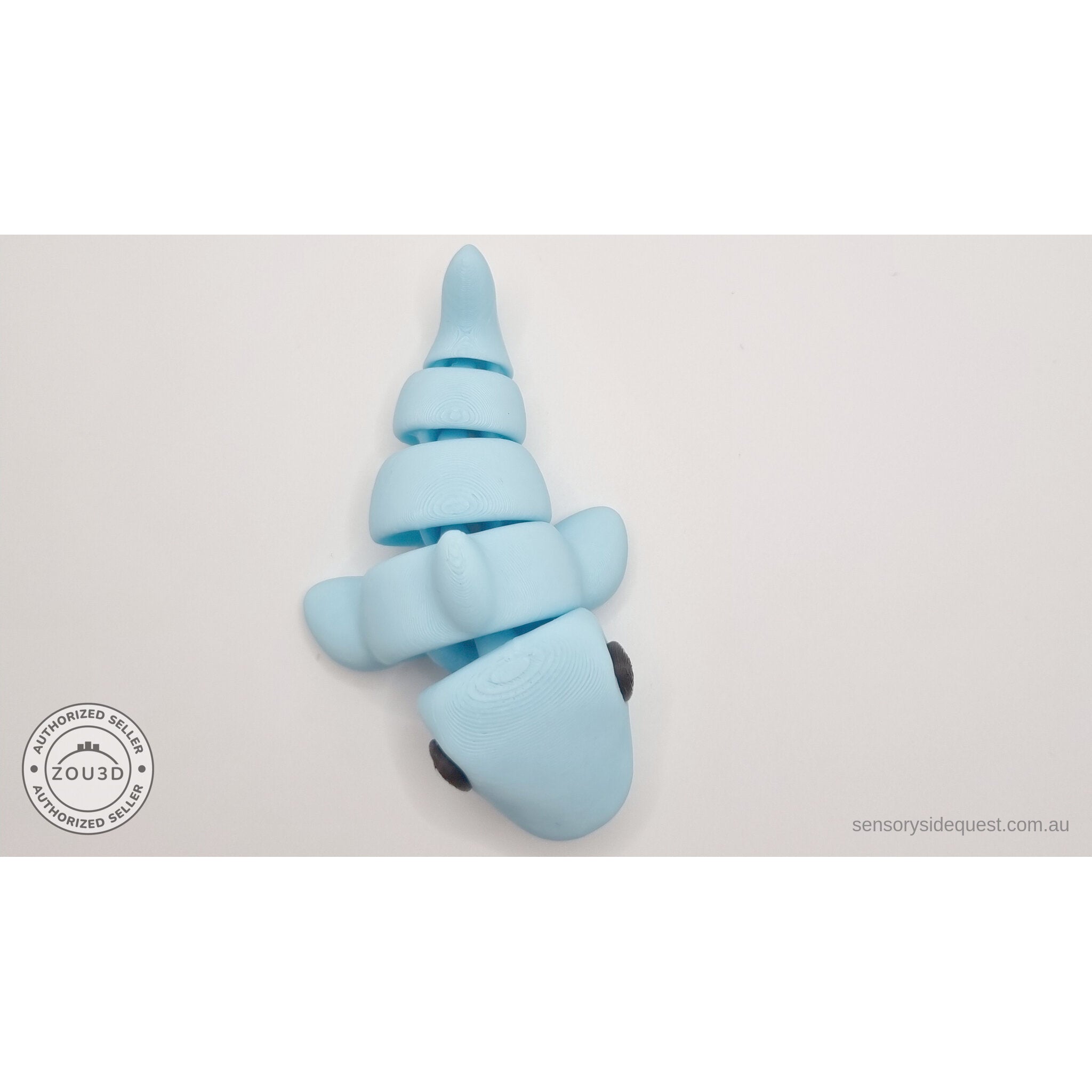 024-SHK Baby Shark in ice blue matte, upright vertical twisted pose showing full flex range — 3D printed fidget toy by Sensory Sidequest