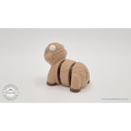 Baby Highland Cow 3D printed fidget toy — rear top view showing shaggy back texture and articulation — Sensory Sidequest