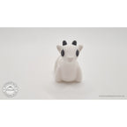White Baby Goat 3D printed articulated toy — direct rear view showing tail nub and body