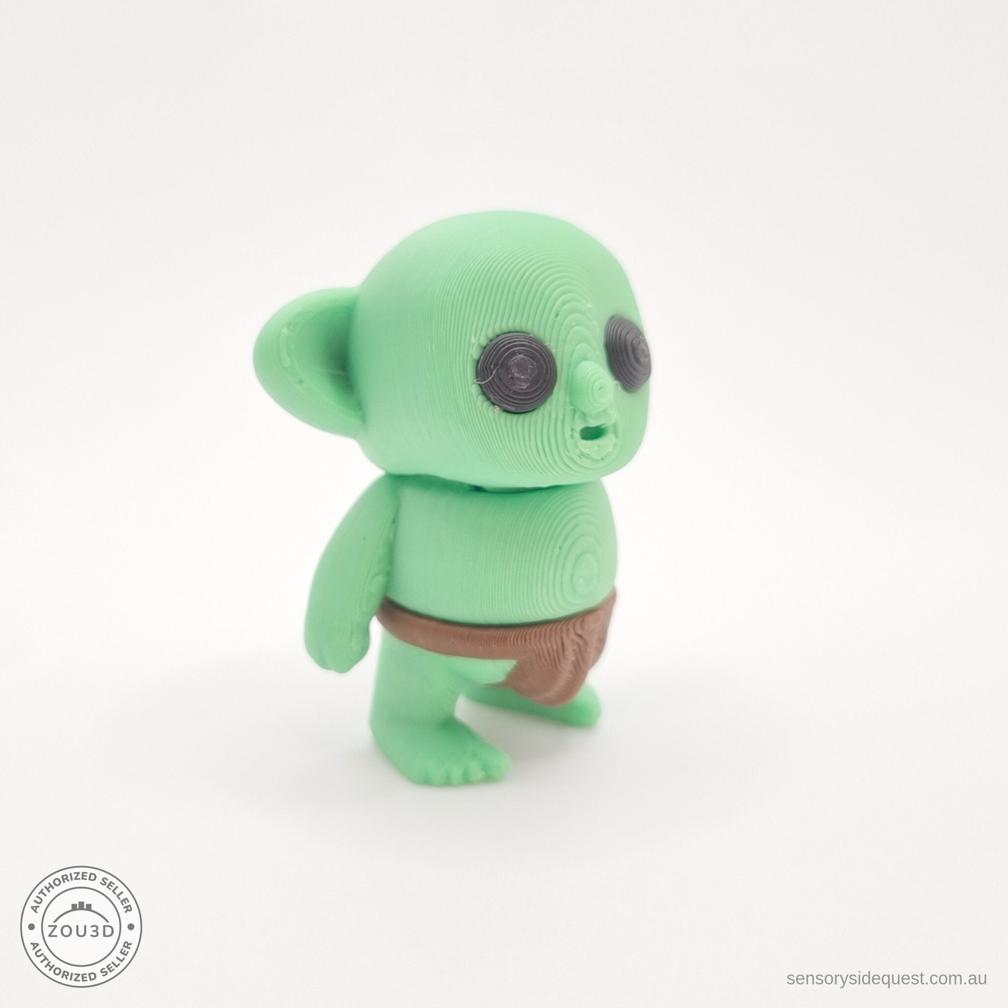 Green Tiny Goblin 3D printed toy — 3/4 right angle showing articulated body