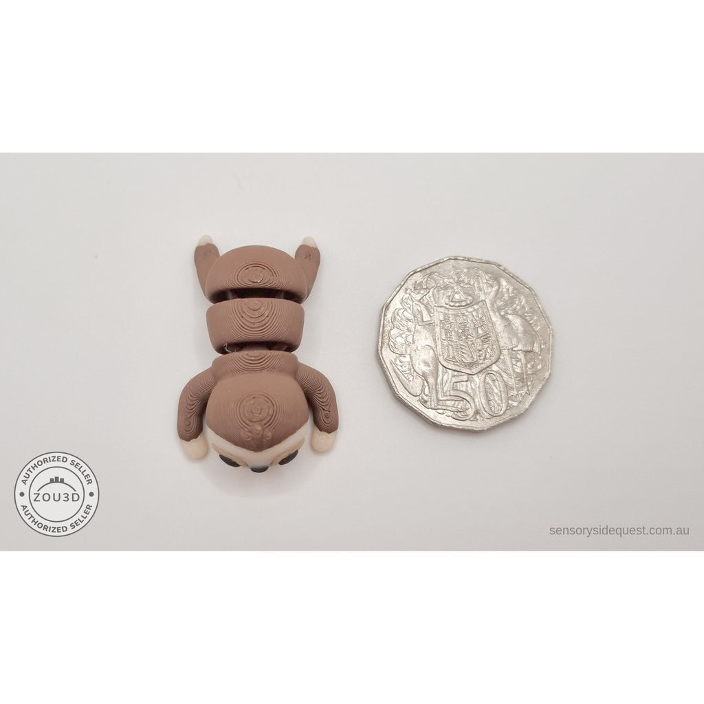 Baby Sloth articulated fidget toy next to Australian 50c coin for size reference — own photo by Sensory Sidequest