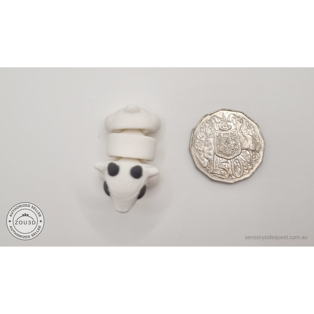 White Baby Goat keychain 3D printed articulated toy beside Australian 50 cent coin for scale