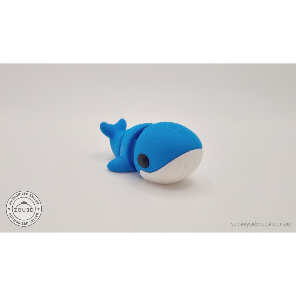 Baby Blue Whale 3D printed fidget toy — rear overhead angle showing dorsal surface and tail flukes, own photo by Sensory Sidequest