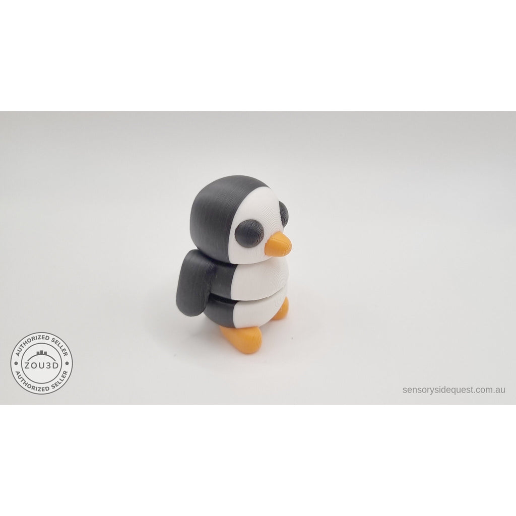 Penguin articulated fidget toy compressed flat showing articulated segments from back, demonstrating full range of motion — 3D printed articulated fidget toy by Sensory Sidequest