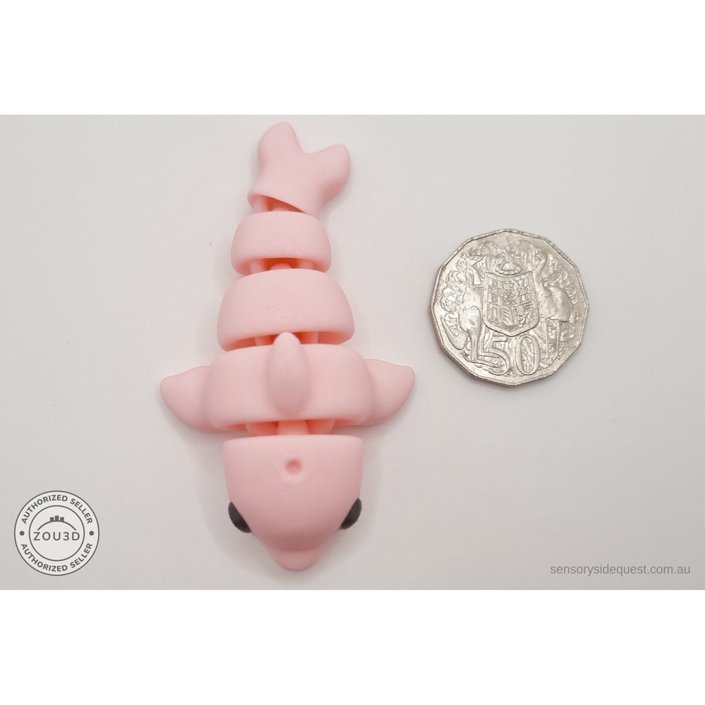 Pink Baby Dolphin 3D printed articulated fidget toy shown with Australian 50 cent coin for scale — Sensory Sidequest Australia