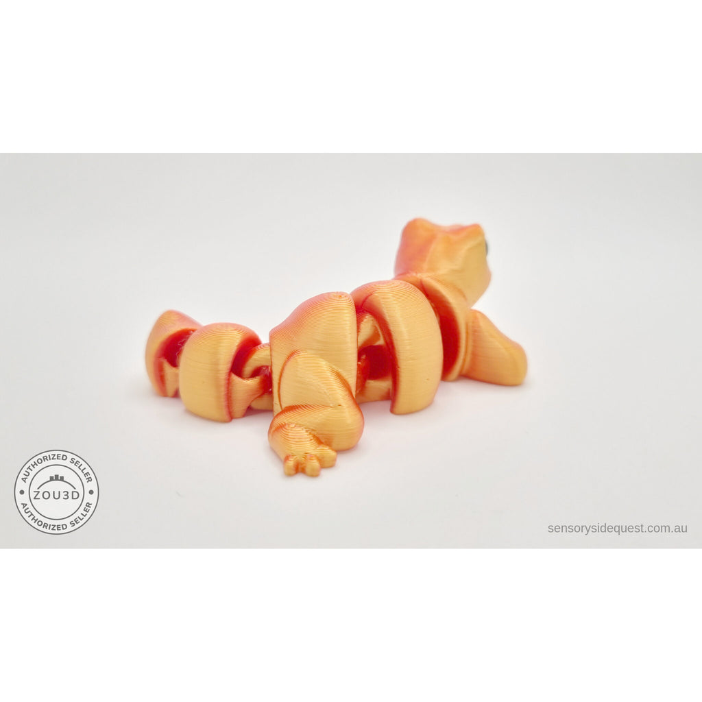 Red-gold Baby Lizard 3D printed articulated fidget toy — rear view showing tail and body articulation detail — Sensory Sidequest