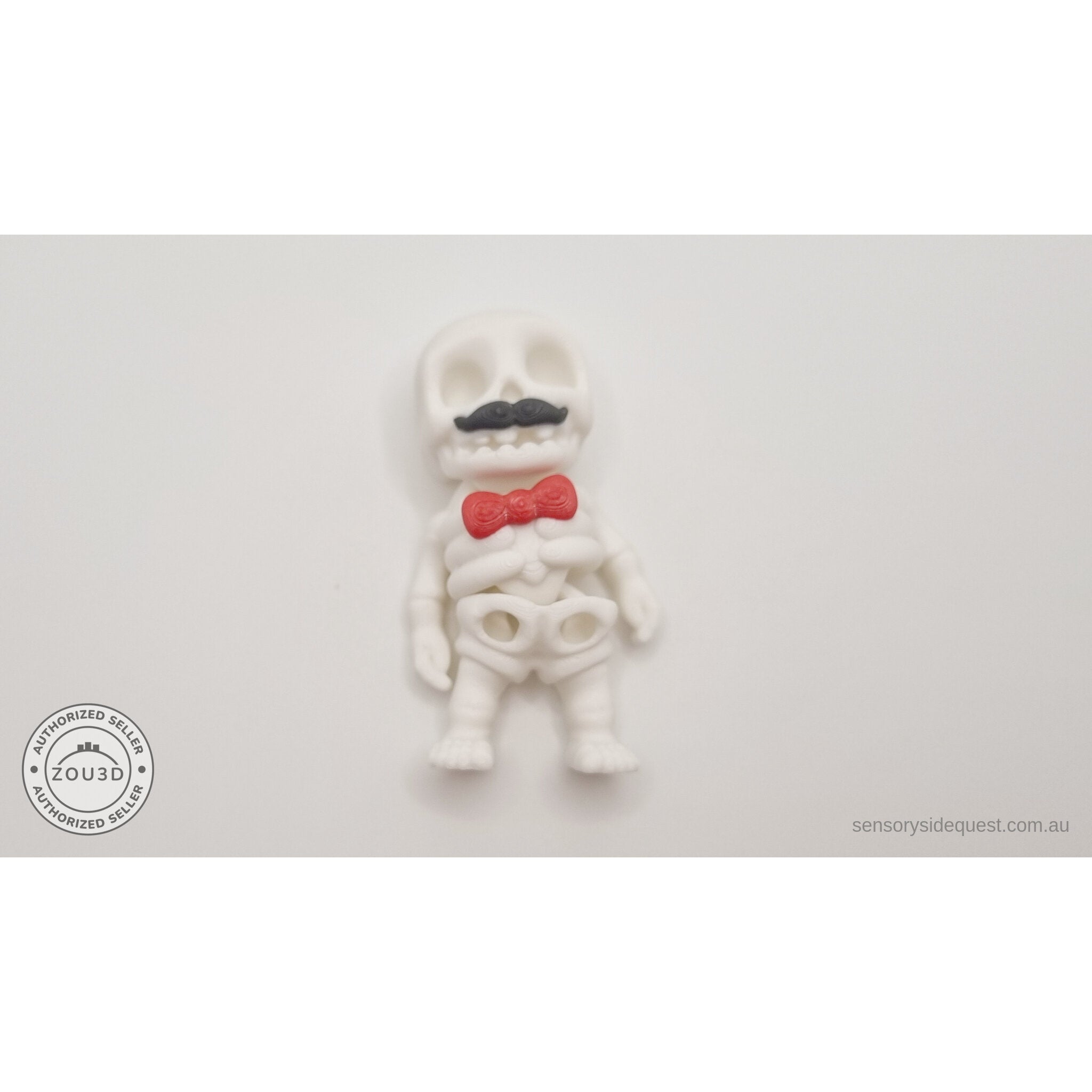 Mr.Skeleton Moustache variant flat lay showing fully articulated joints and poseable limbs — 3D printed articulated fidget toy by Sensory Sidequest