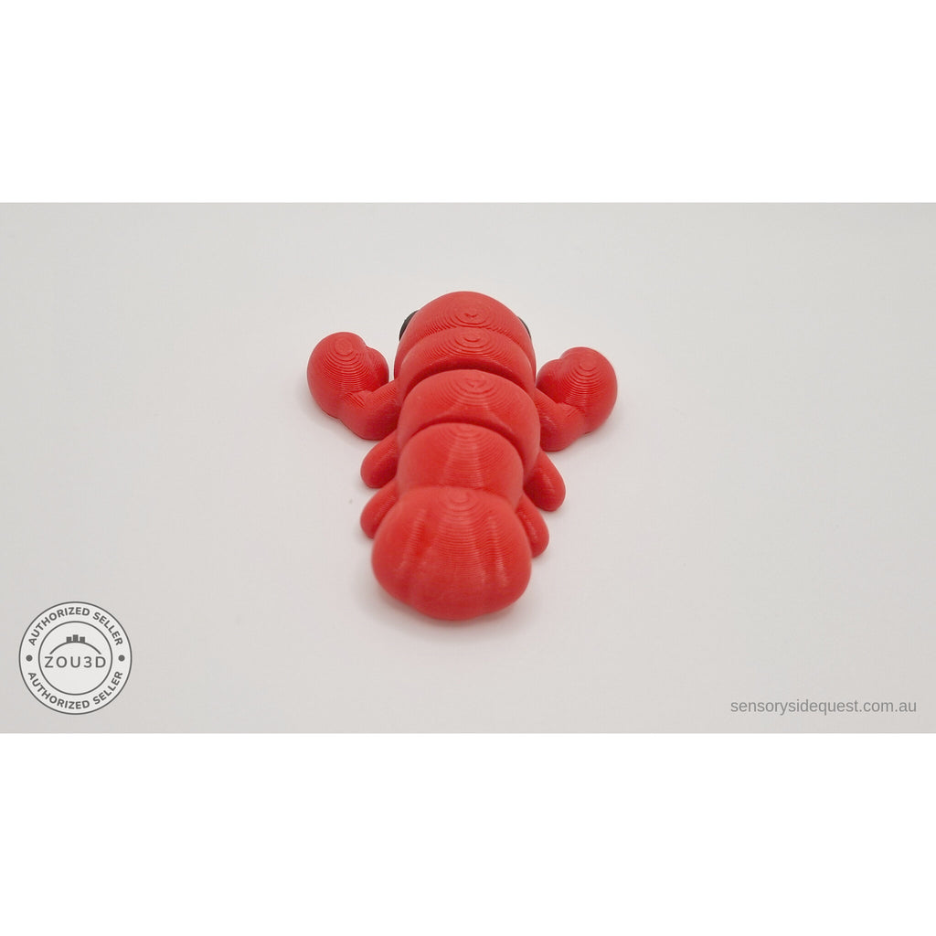 Baby Lobster 3D printed fidget toy in red silk — rear angle from above showing claws spread wide and tail fan segments