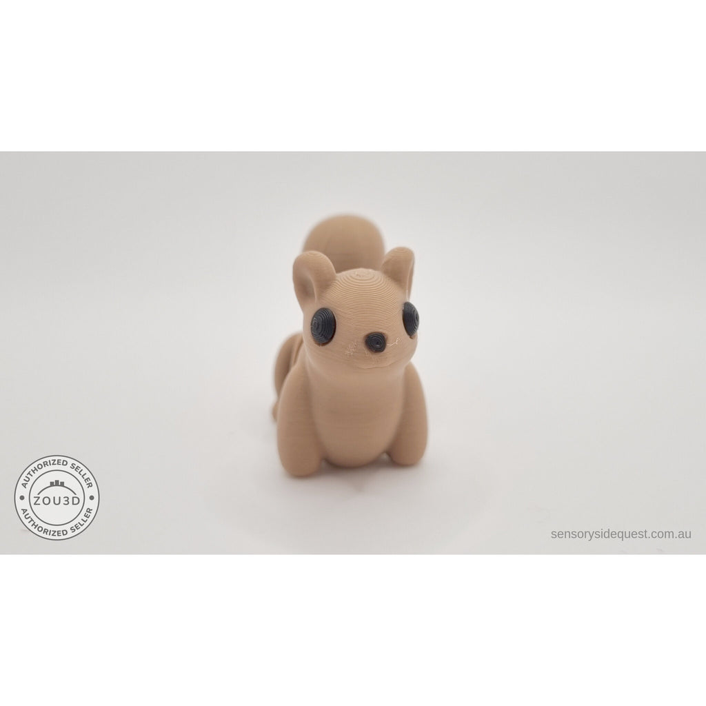 Baby Squirrel Zou3D 3D printed articulated fidget toy — straight front face view showing large black eyes, paws, and arching tail overhead — Sensory Sidequest Australia