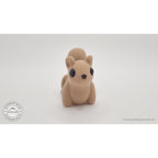 Baby Squirrel Zou3D 3D printed articulated fidget toy — straight front face view showing large black eyes, paws, and arching tail overhead — Sensory Sidequest Australia